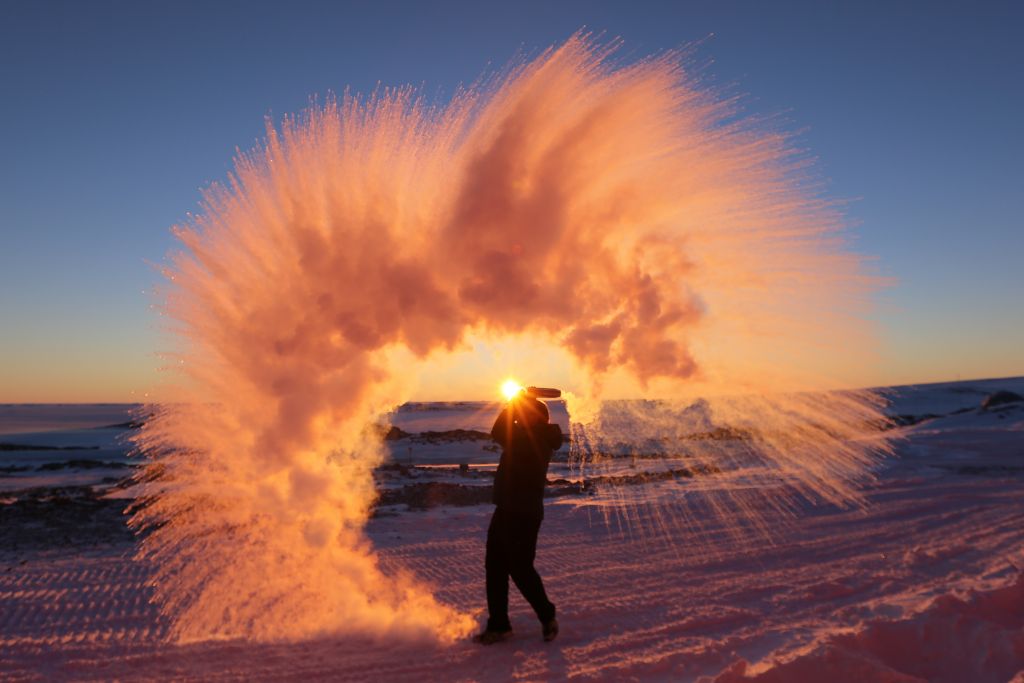 hot tea into the air in Arctic