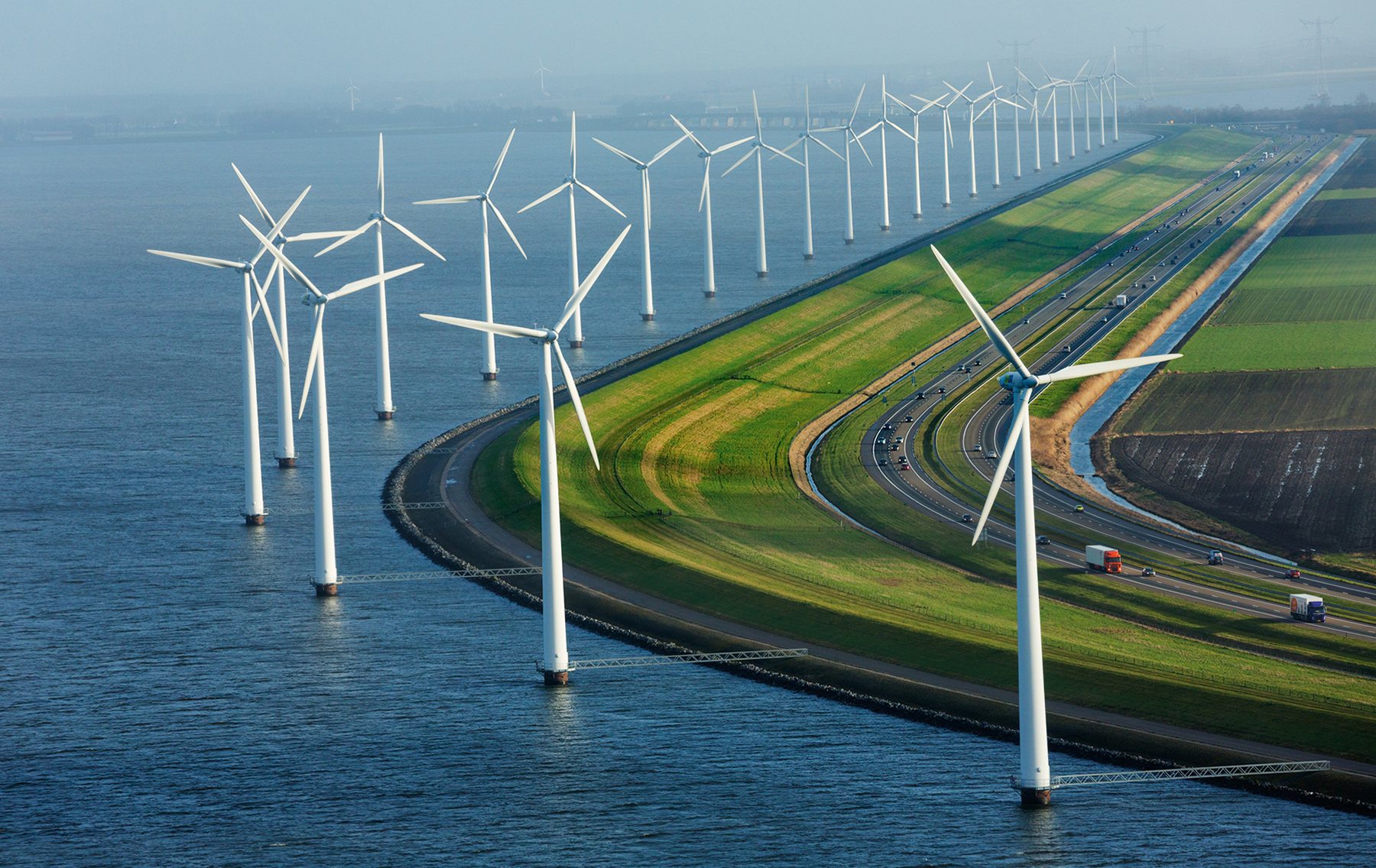 Modern dykes, windmills and highways in the Netherlands